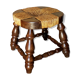 Low vintage regional stool in solid wood with straw top