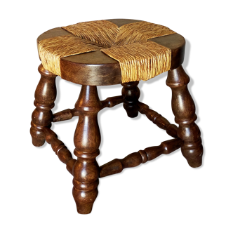 Tabouret bas vintage régional en bois massif au dessus paillé