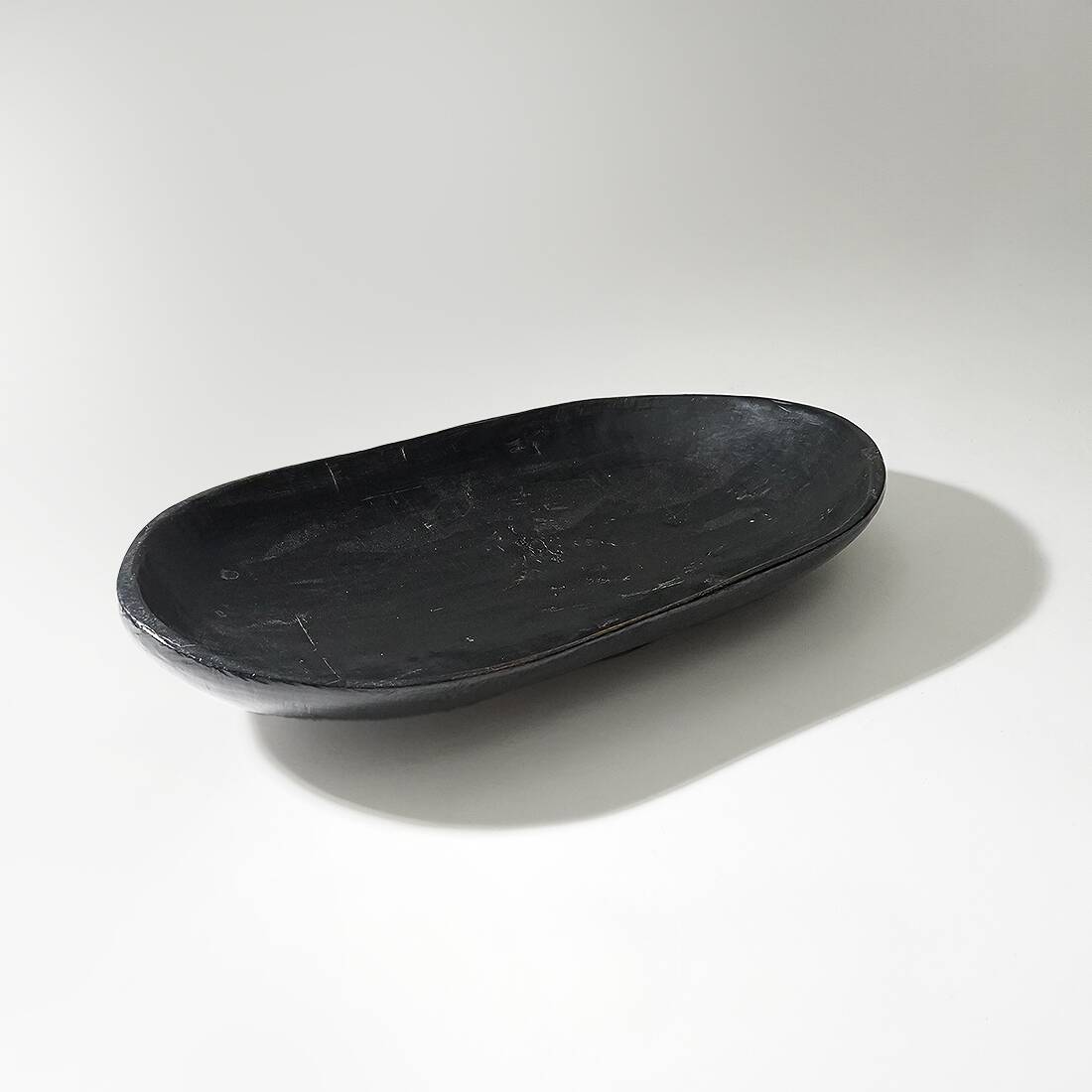 Organic shaped black wooden bowl, 1960s