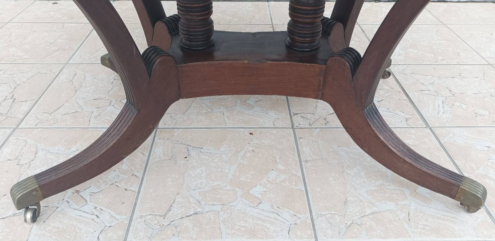 19th-century English style mahogany drop-leaf table.