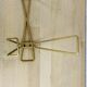 Wall coat rack with golden metal hook from the 1950s