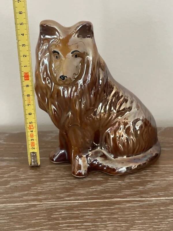 Vintage brown handmade ceramic Collie dog figurine decoration.