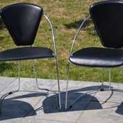 4 chrome and leather chairs designed by Italy