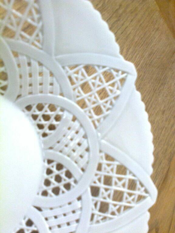 flared bowl white porcelain, lace-style openwork border