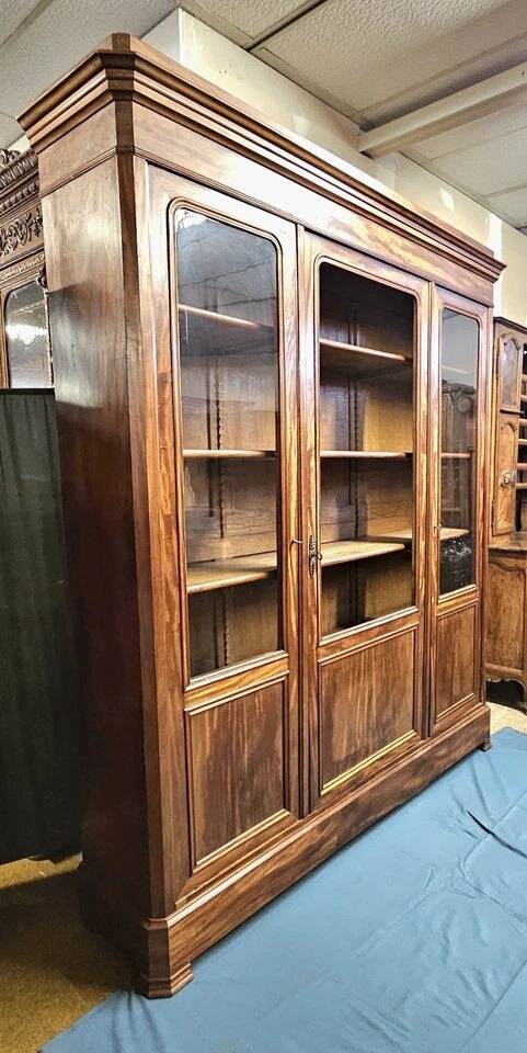 Important library stamped from the Louis Philippe period in mahogany / early