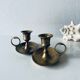 Pair of brass thumb candlesticks
