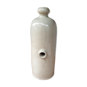 Vintage bottle in enamelled sleet