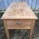 Antique solid cherry farmhouse table with 3 drawers and 1 pull out.