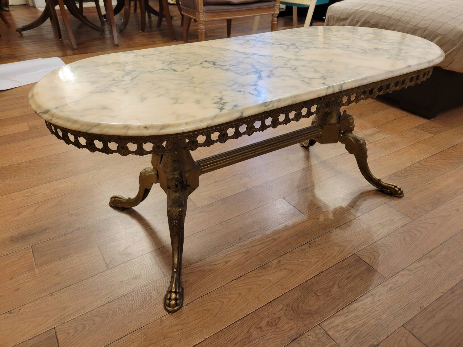Coffee table in gilded bronze and marble