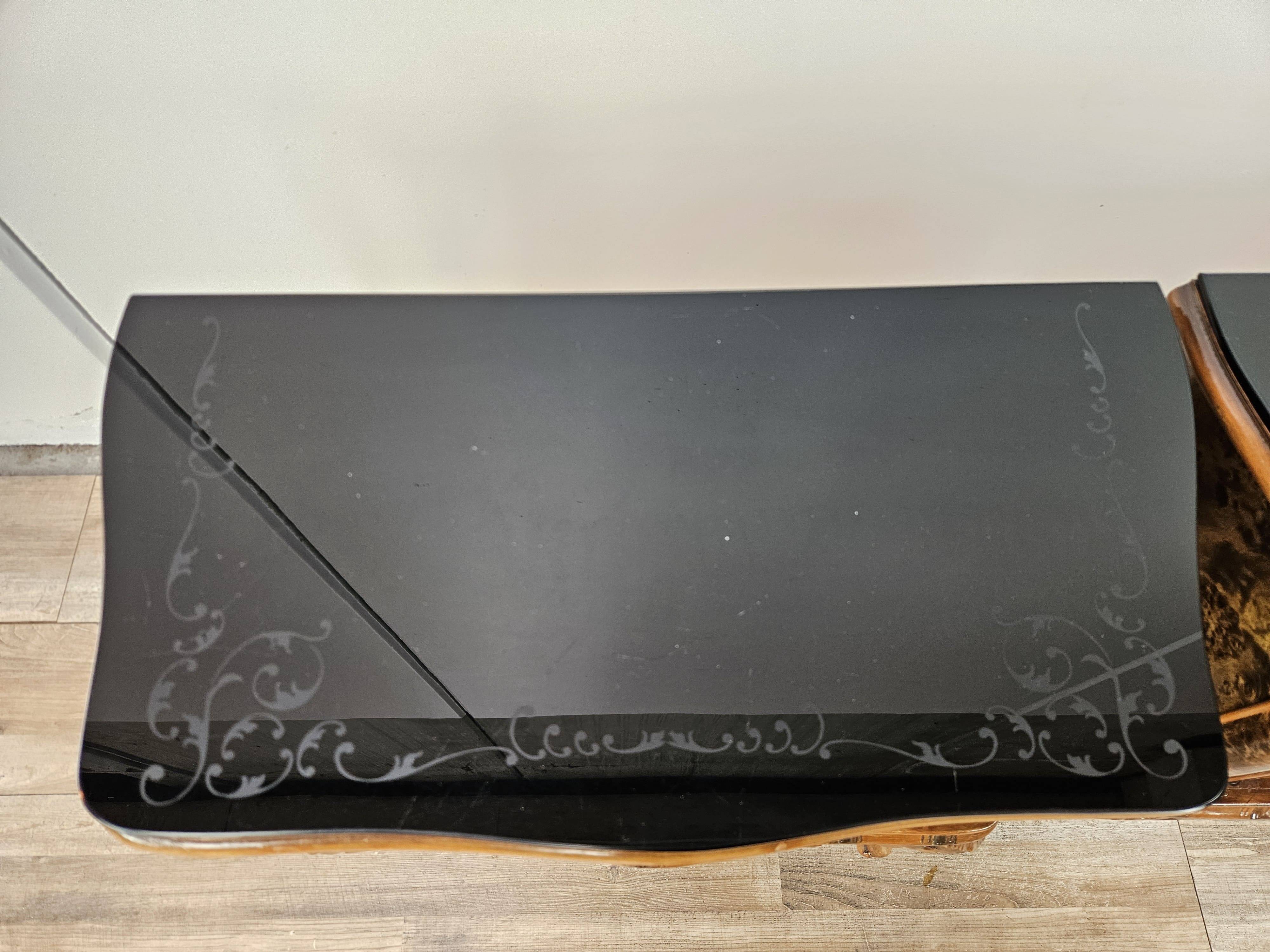 1950s Chippendale bedside tables with black glass