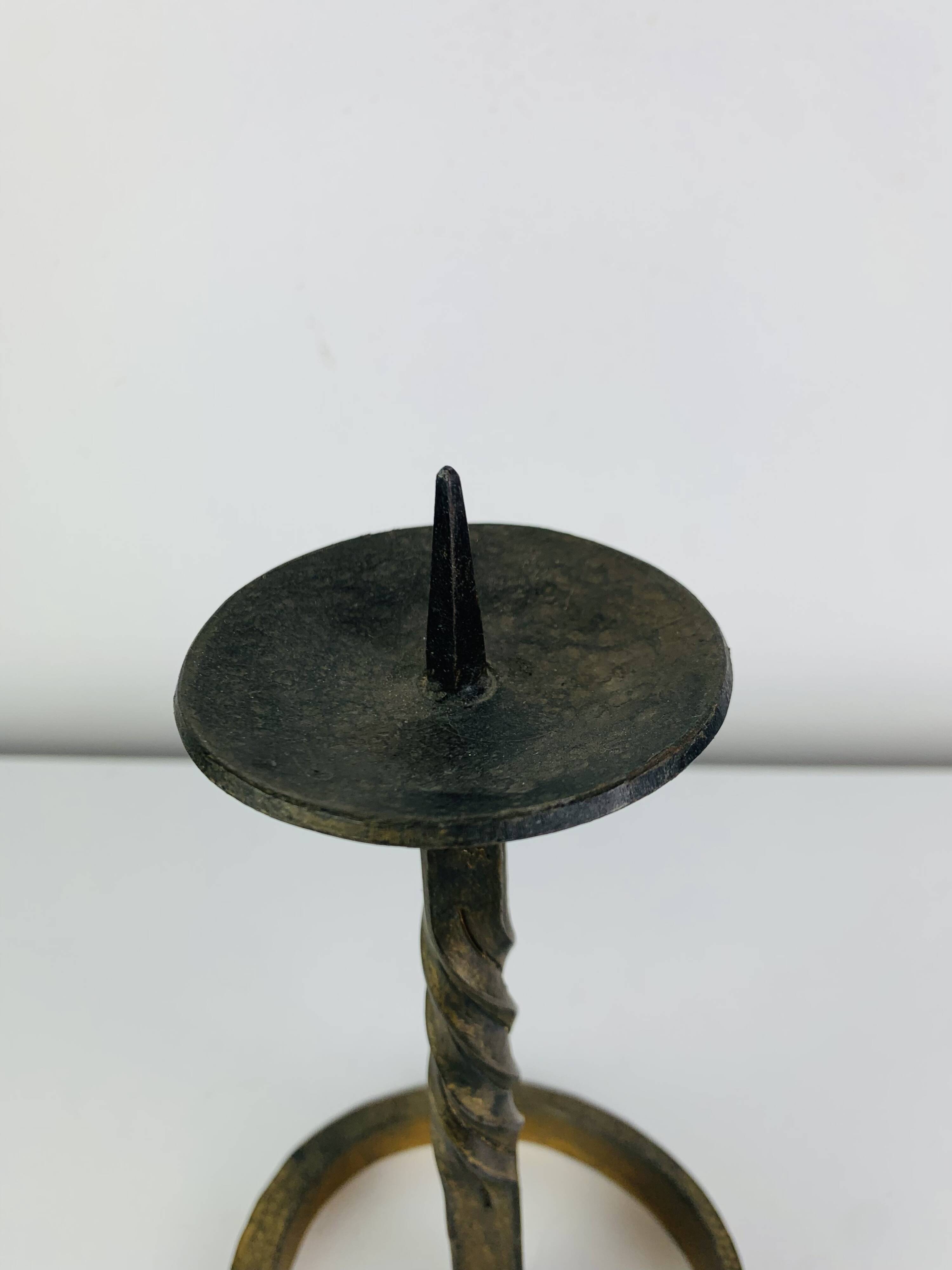 Brutalist candle holder, wrought iron with a golden patina.