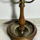 Umbrella stand and English-style wooden and brass canes, 20th century.