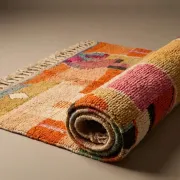 Moroccan handwoven wool rug in colour block peach, pink, teal, and orange, 122x183 cm.