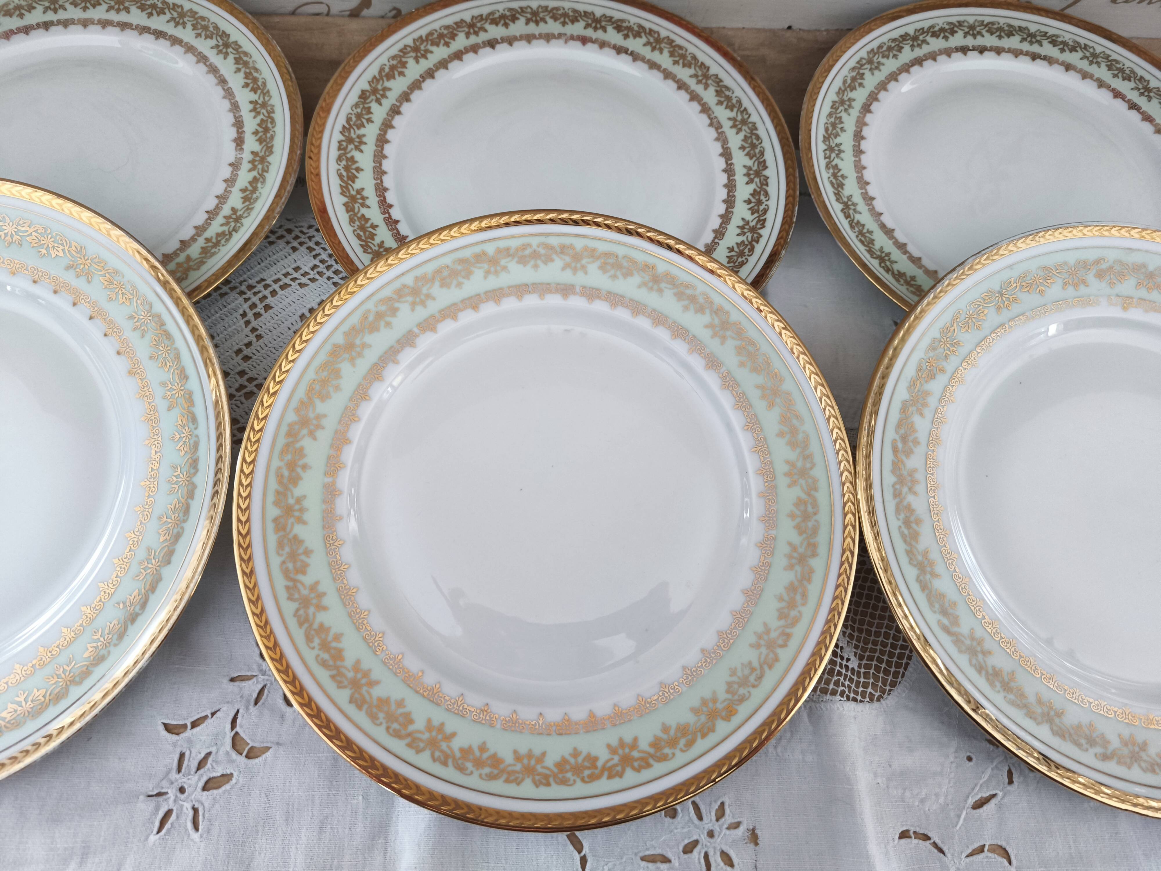 Set of 8 PL France porcelain dinner plates, water green marli and frieze