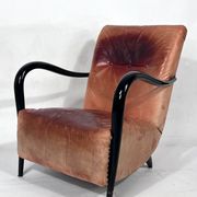 Sculptural Italian Mid-century leather and curved wood armchair from 50s