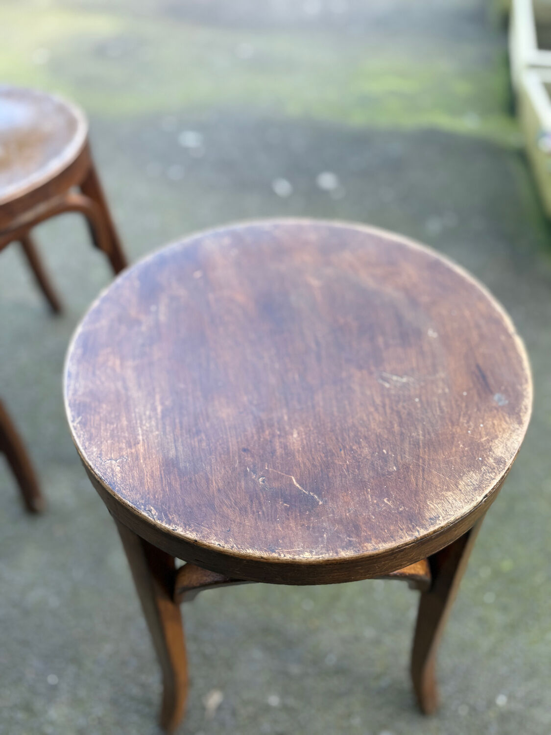 Set of four curved wooden stools stamped Baumann model 92.