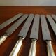 12 antique Art Deco knives silver metal and molten steel blades
