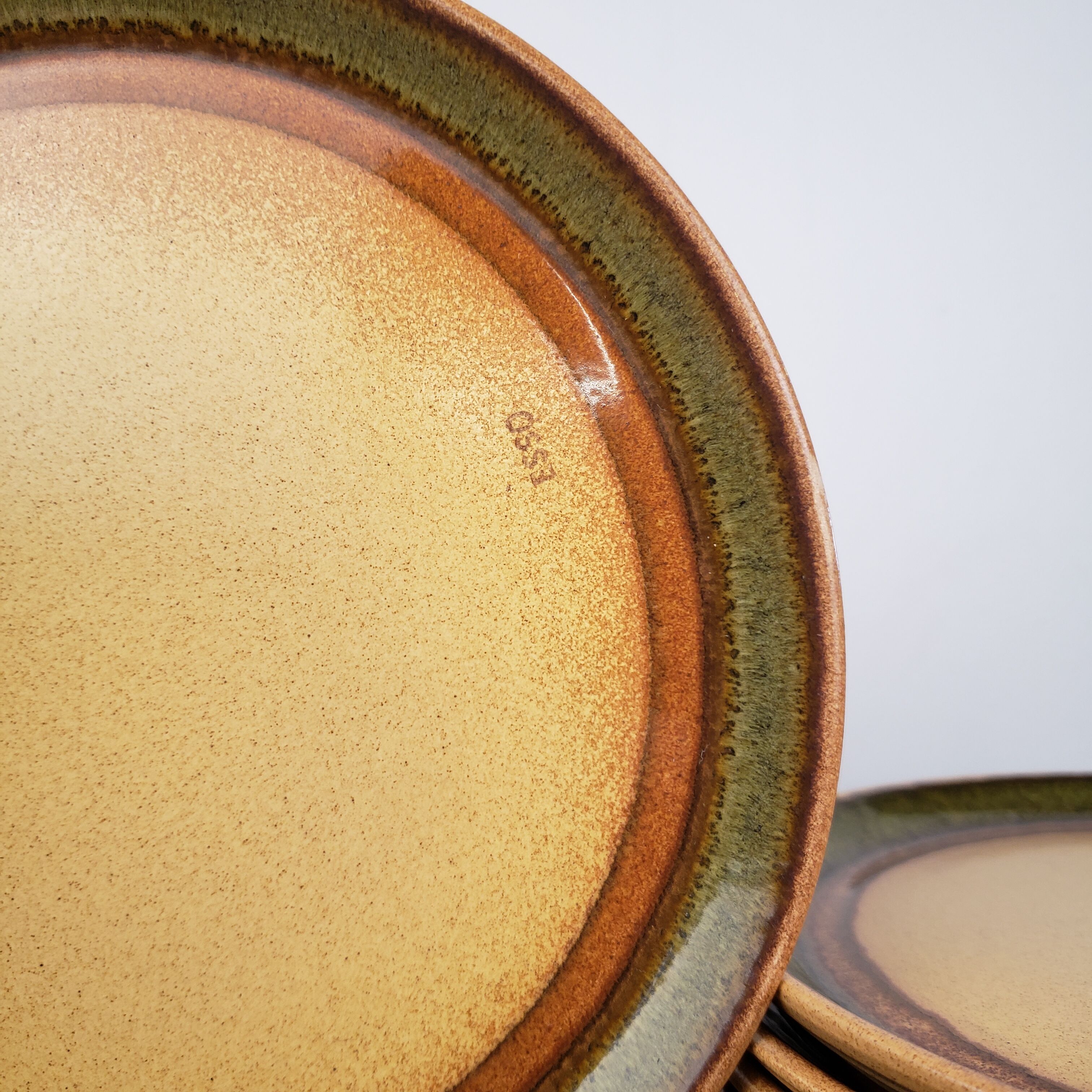 8 flat stoneware plates