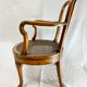 Fauteuil bas anglais en bois ajouré à assise cannée, 19e siècle