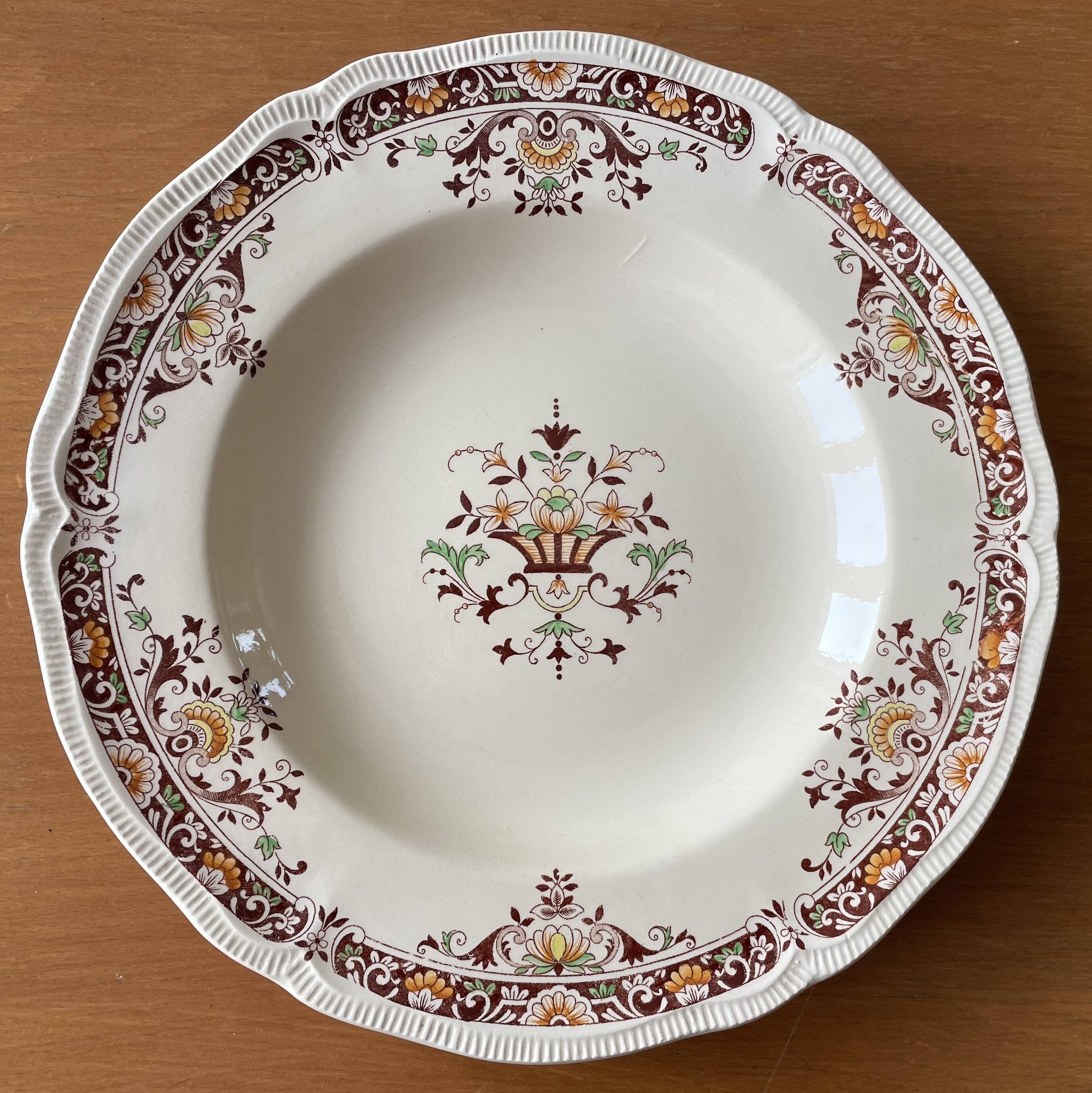 6 antique semi-deep plates in Longchamp earthenware.