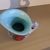 Granite ceramic pitcher and heart symbol