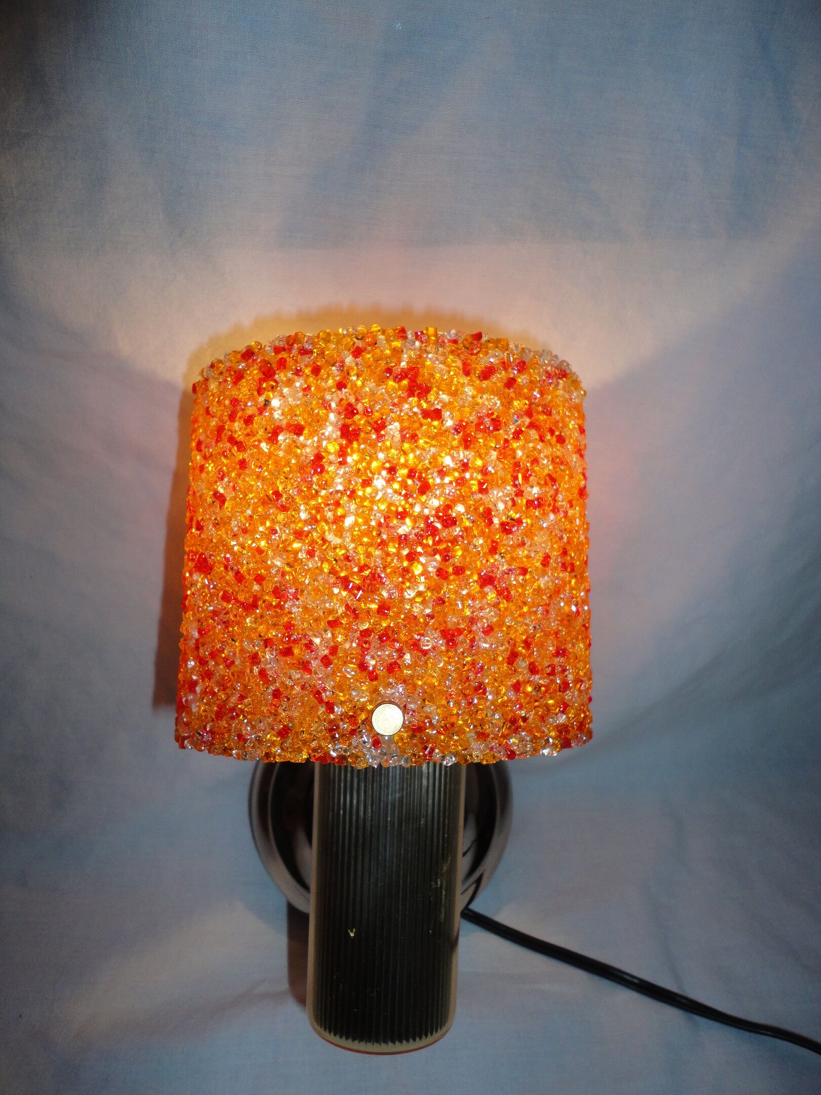 Pair of vintage applique in orange and brass perspex
