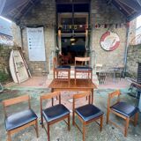 Set of 6 chairs and dining room table with extensions “BCM” circa 1960