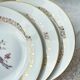 4 Assiettes creuses en porcelaine de Limoges motif oiseau de paradis