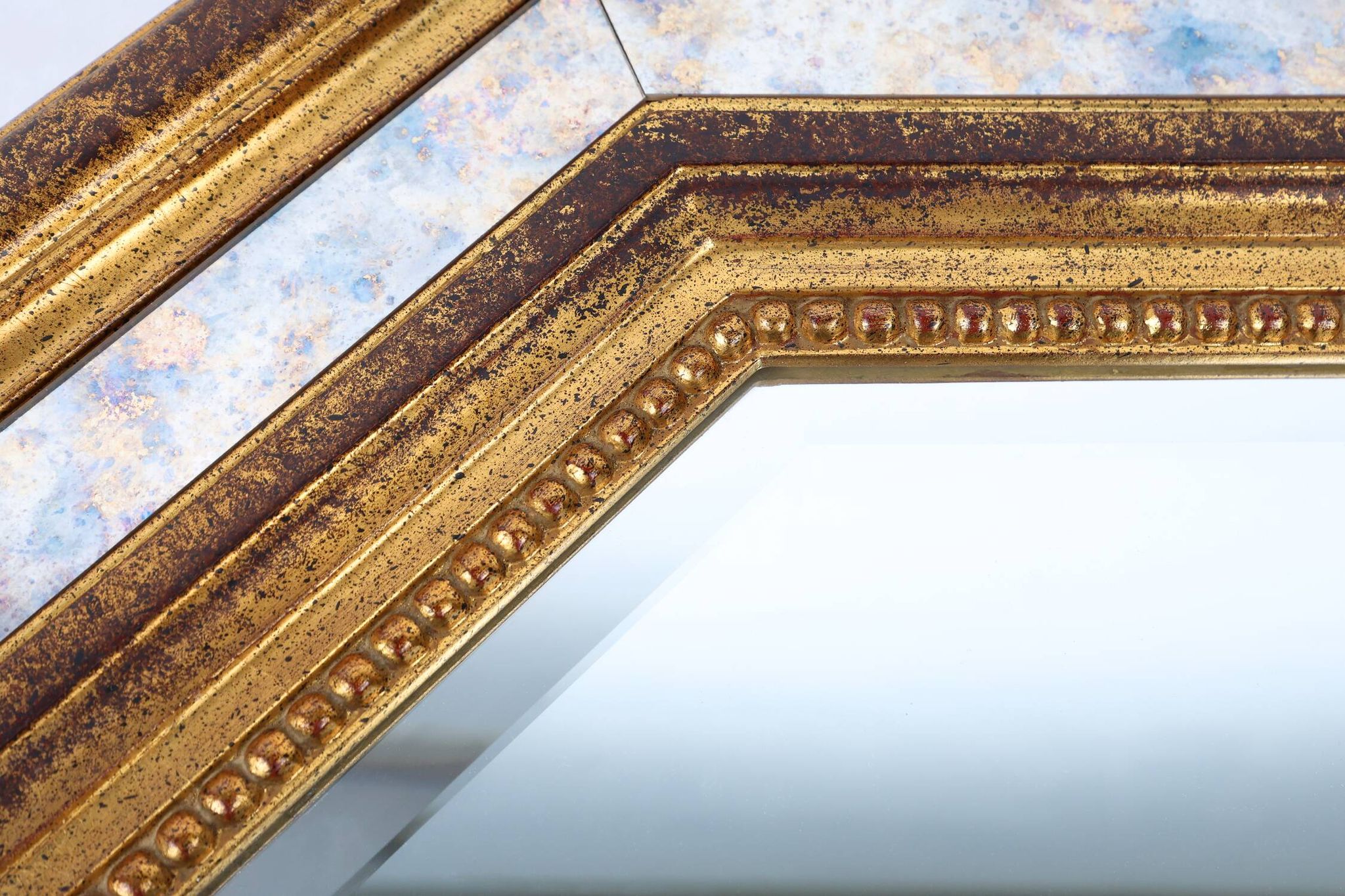 Gilded octagonal mirror by Deknudt Belgium decorated with smoked mirror gla