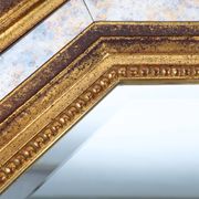 Gilded octagonal mirror by Deknudt Belgium decorated with smoked mirror gla