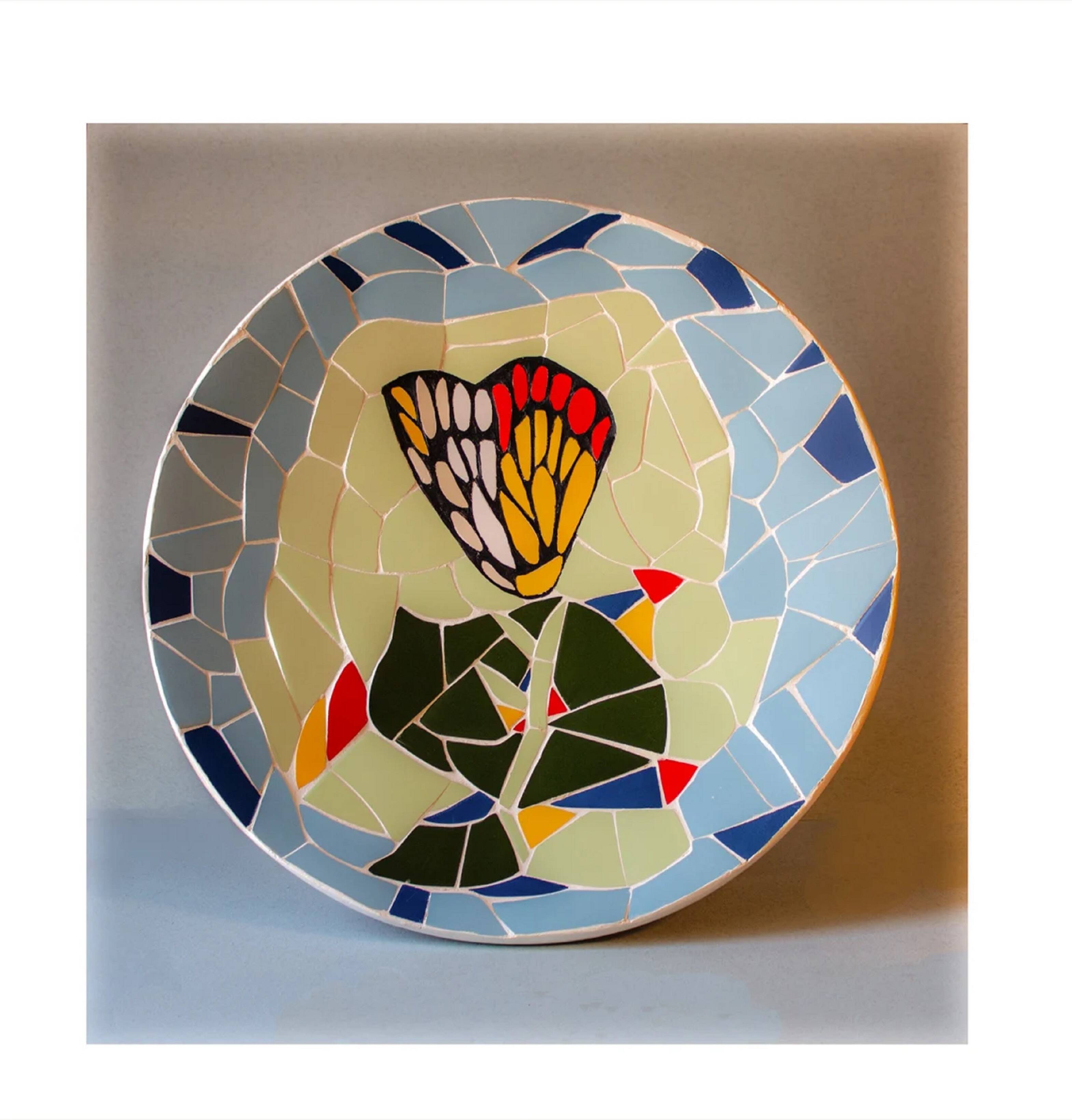 Original plate decorated with colored ceramic with the Catalan modernist trencadís technique