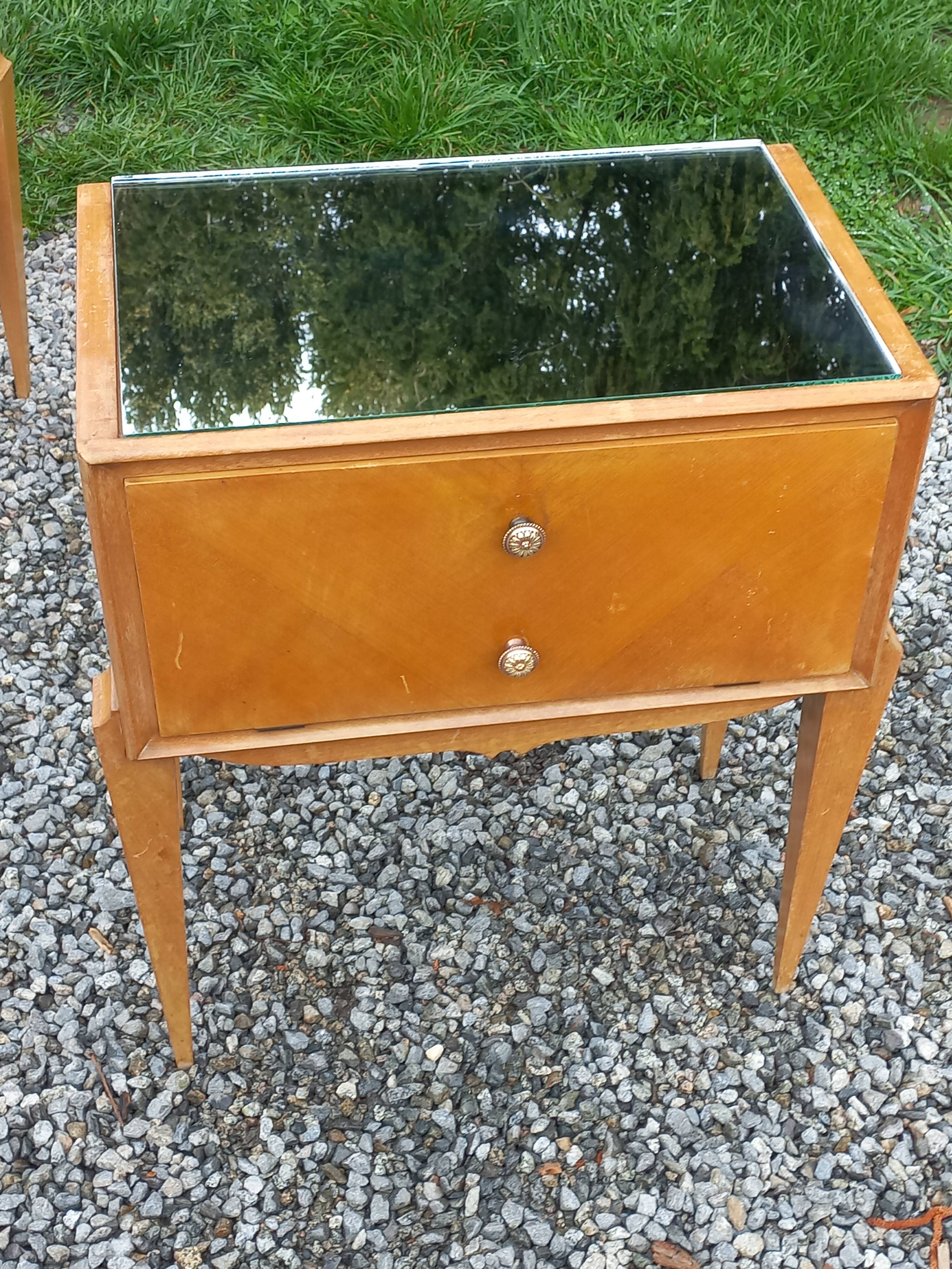 Vintage pair of bedside tables from the 1950s in sycamore and a mirror.