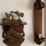 Black Forest carved wooden wall console, harness with wolf decoration