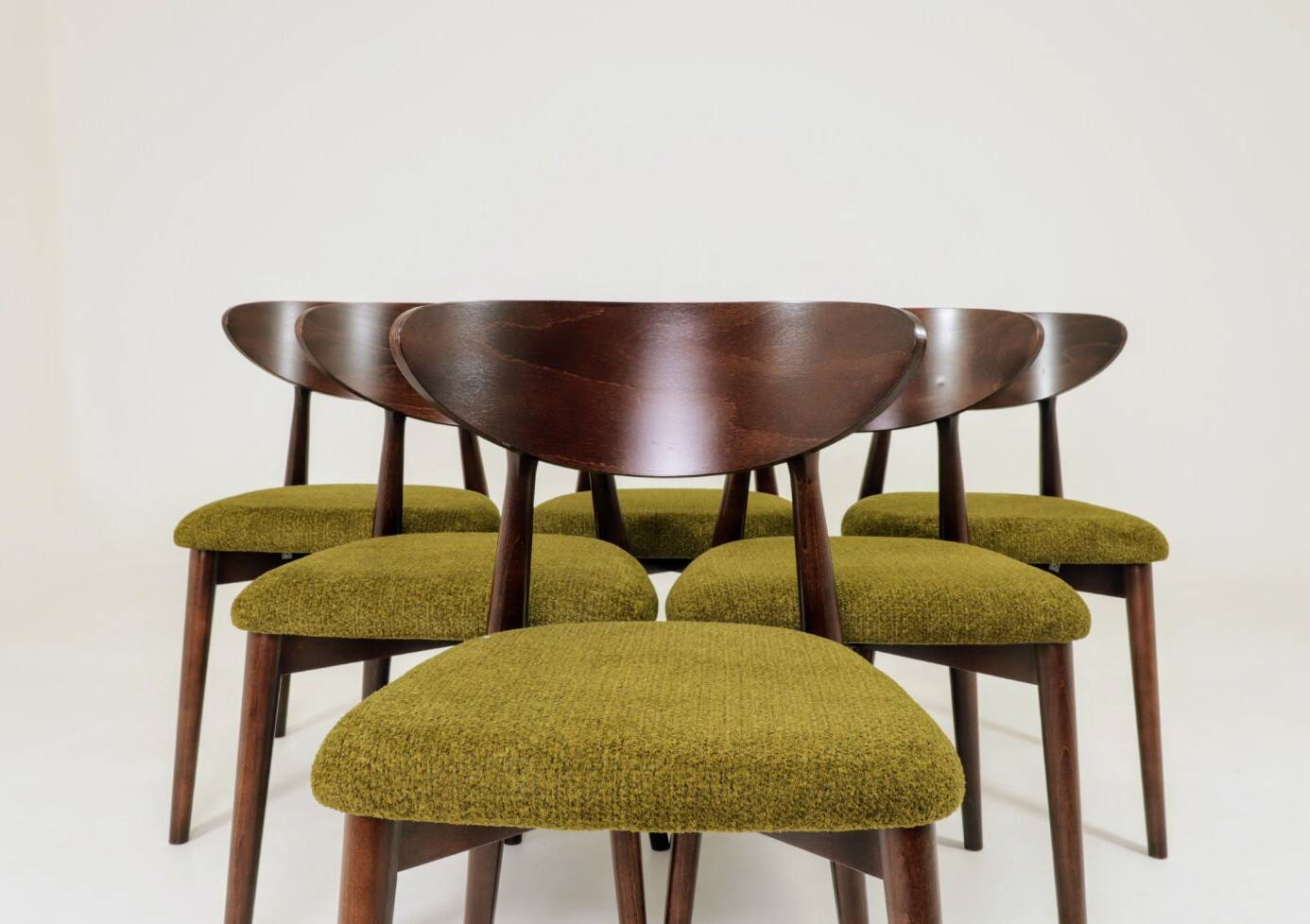 Scandinavian dining chairs set of 10 in sauvage green bouclé.