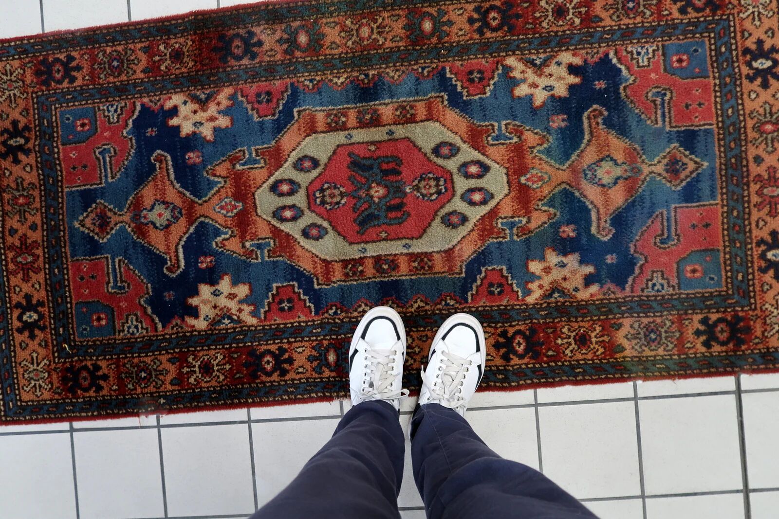 Vintage 1950s German tribal style wool rug, geometric medallion, 84cm x 180cm