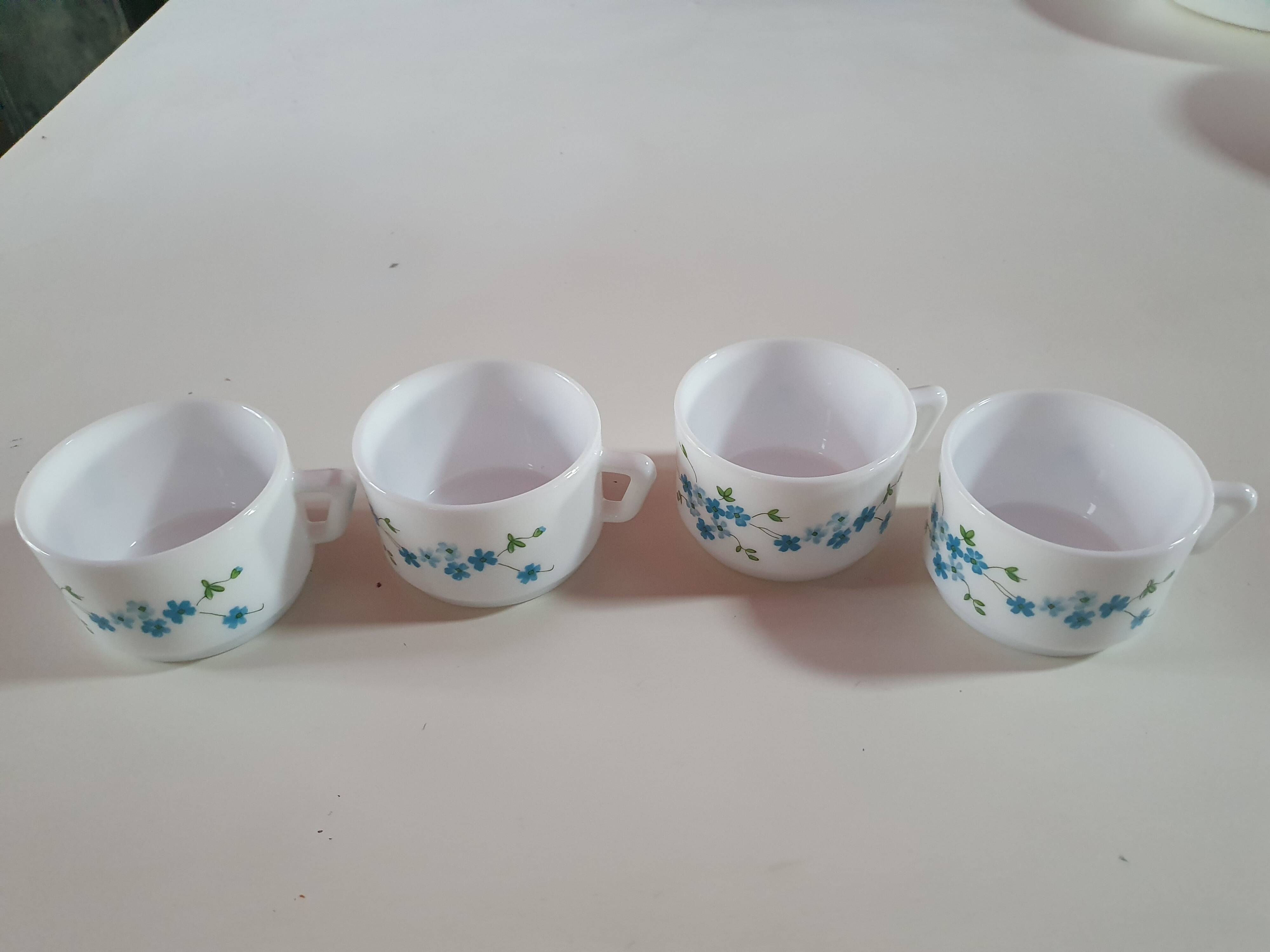 set of 4 vintage arcopal cups with small mysotis blue flowers