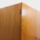 Vintage modernist wardrobe in teak and metal from the 1960s.