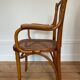 Old thonet armchair in curved wood and rattan cane