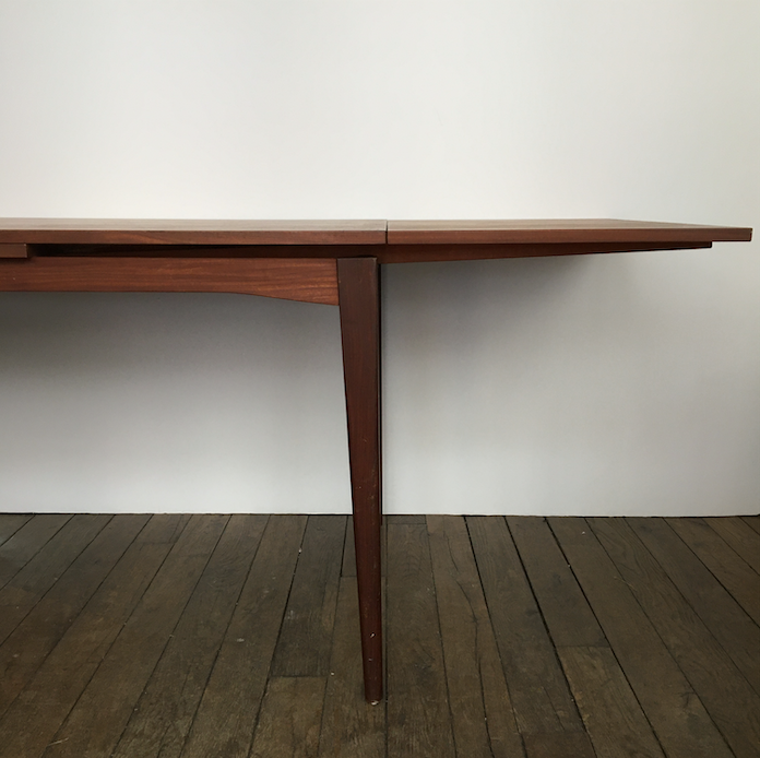 Teak dining table with extensions