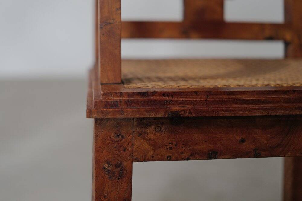 Art Deco armchair, marquetry and cane, circa 1930