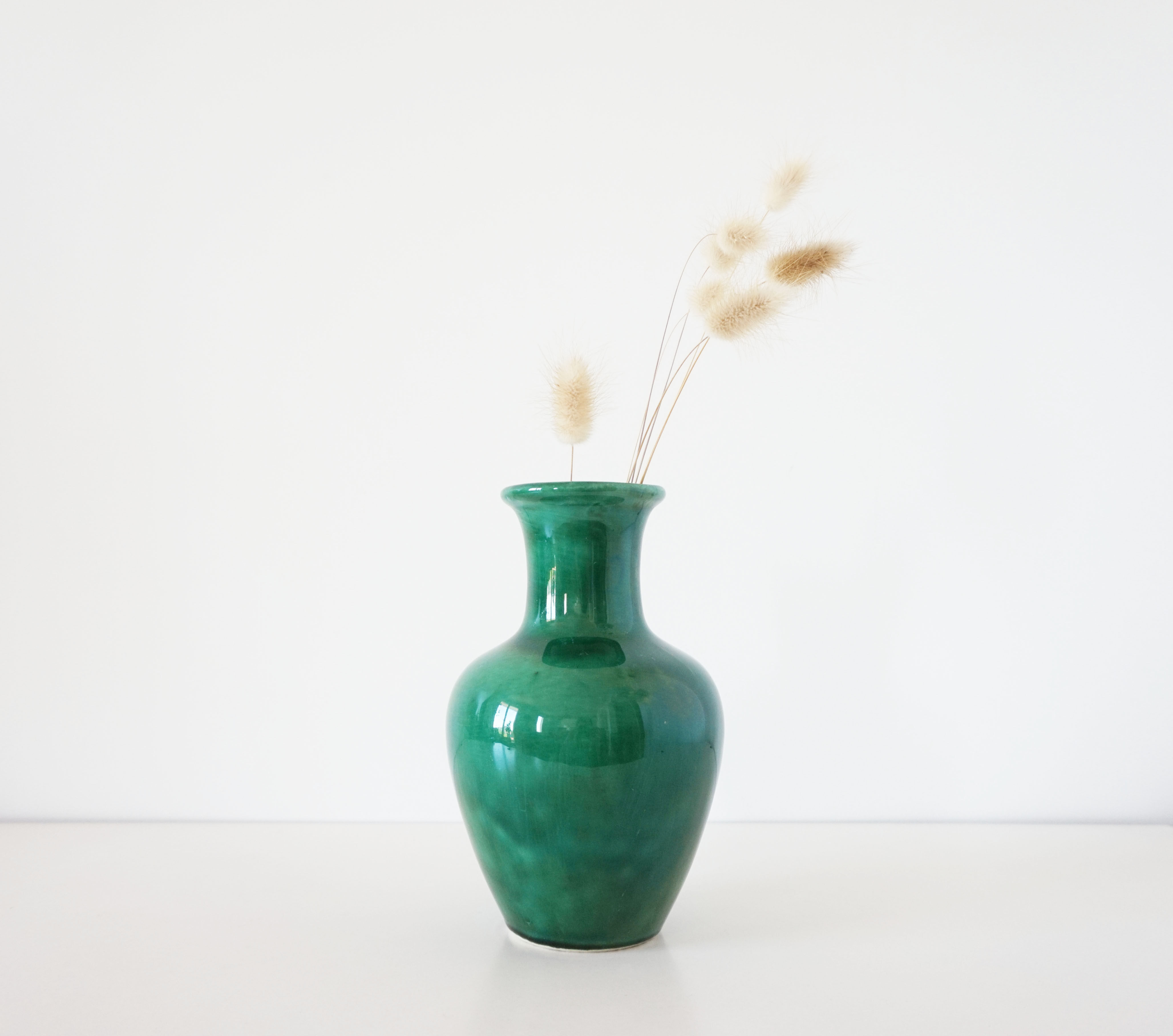 Green iridescent ceramic vase