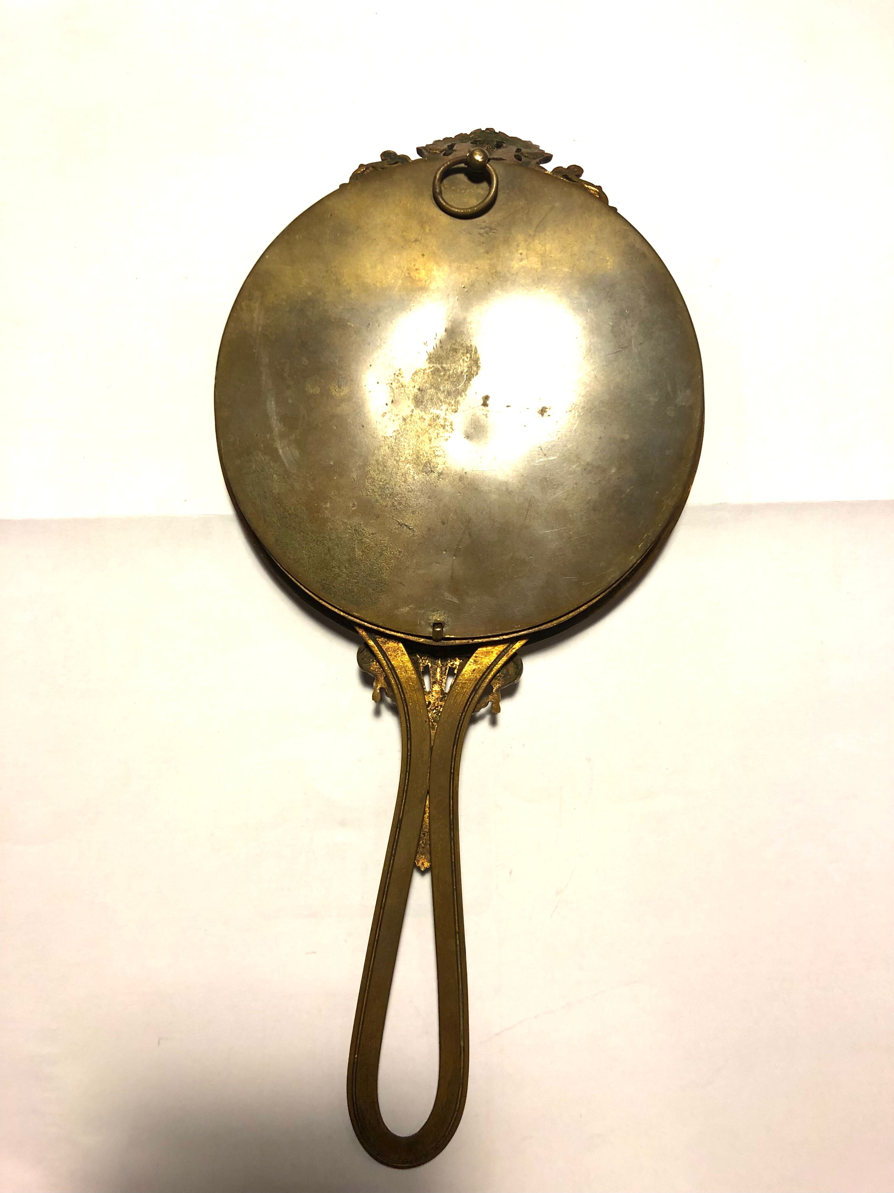 Courtesy hand mirror