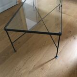 Glass and black metal coffee table