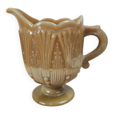 Small antique pressed glass jug in honey colour – moulded decoration