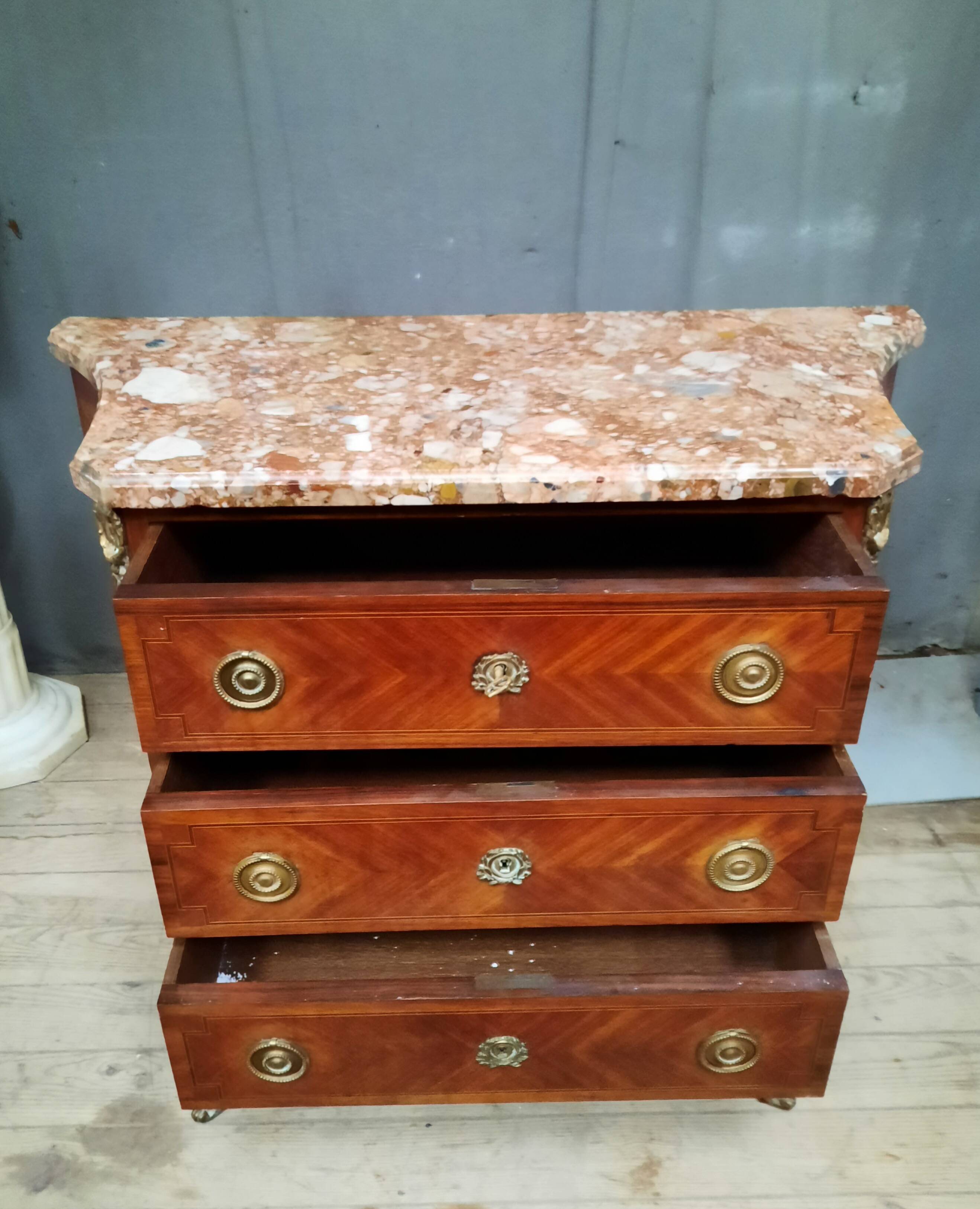 Transitional marquetry chest of drawers