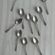 Set of 10 small silver metal spoons