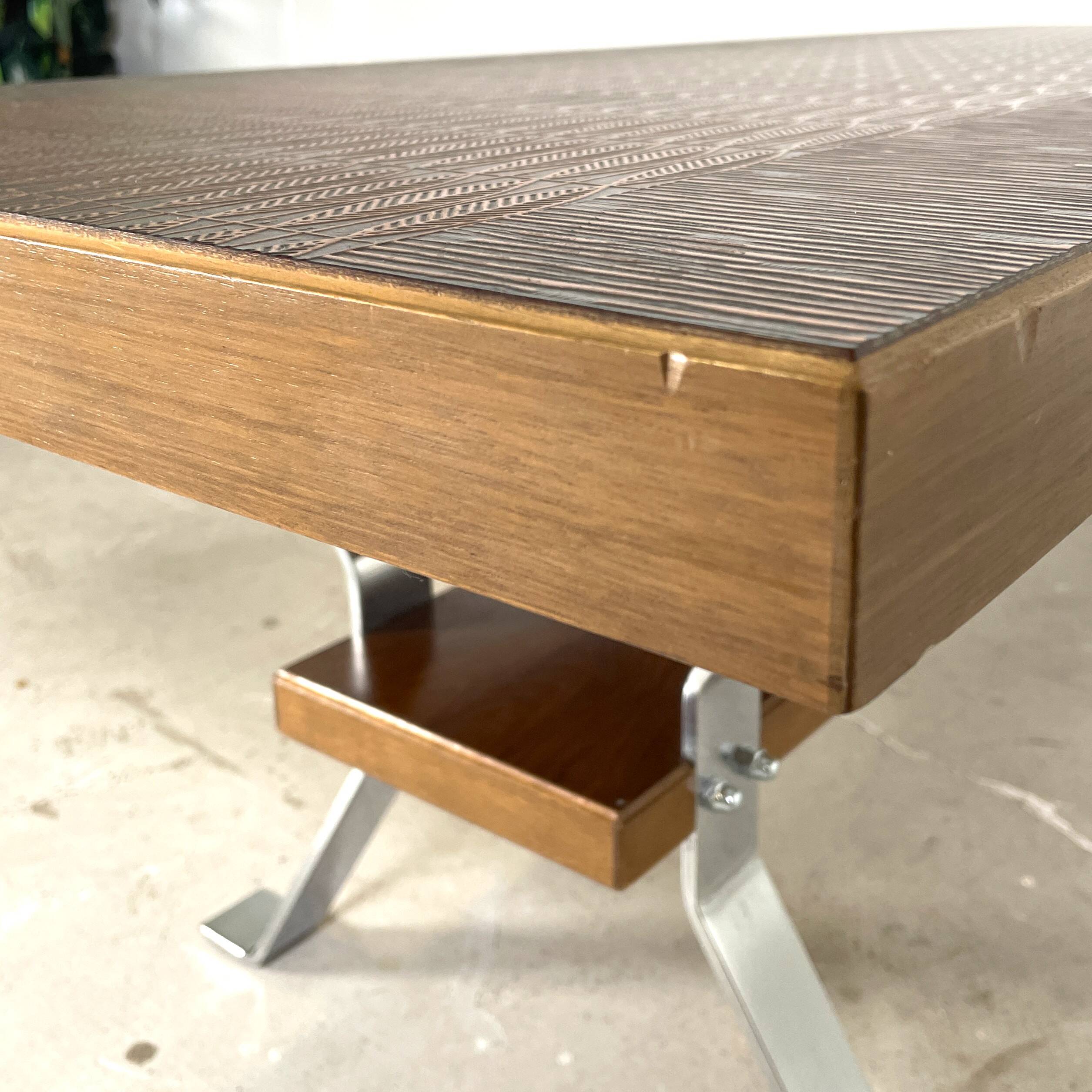 Vintage coffee table with copper top and chrome legs