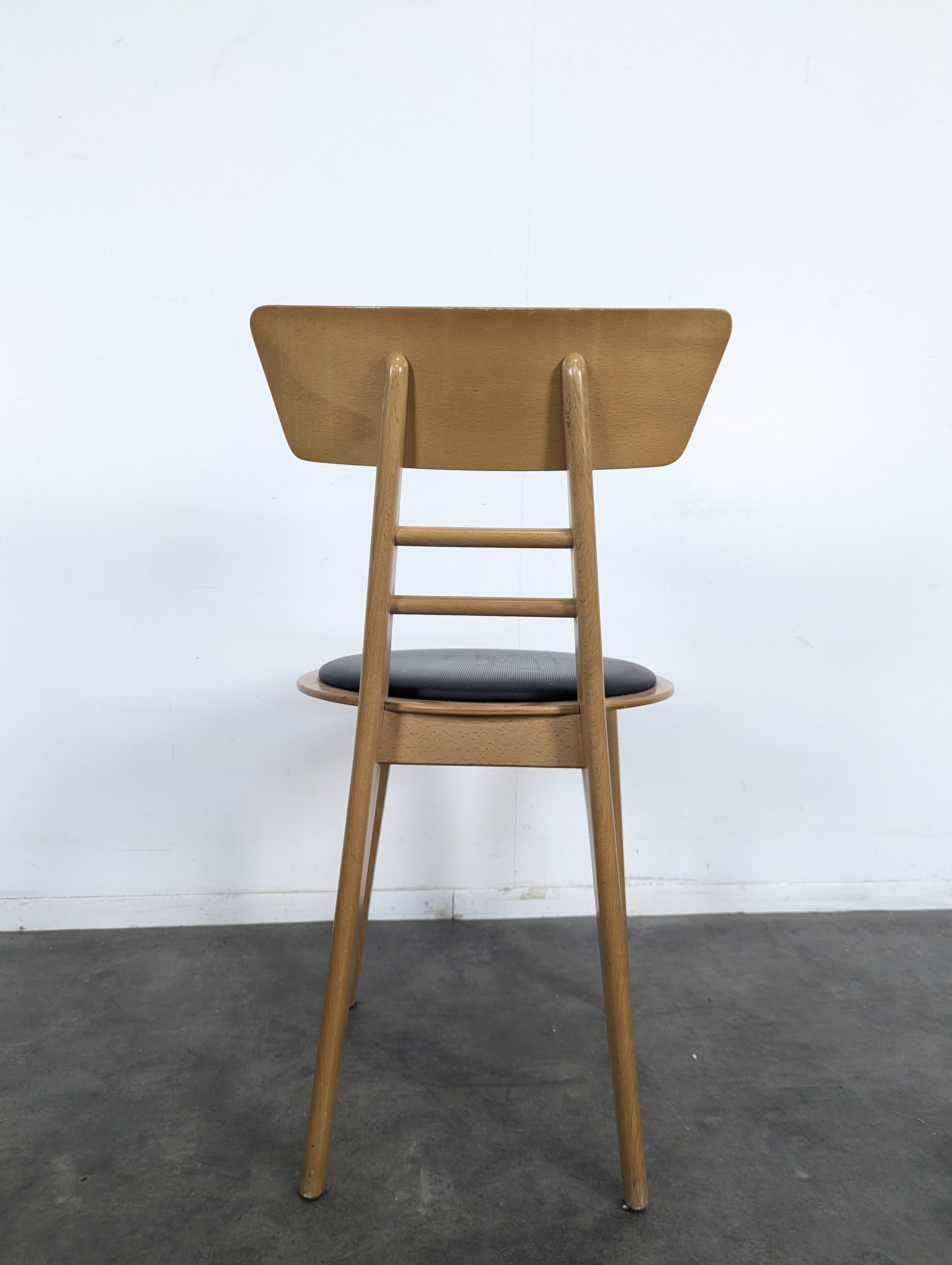 Set of 6 chairs published by Ton.
