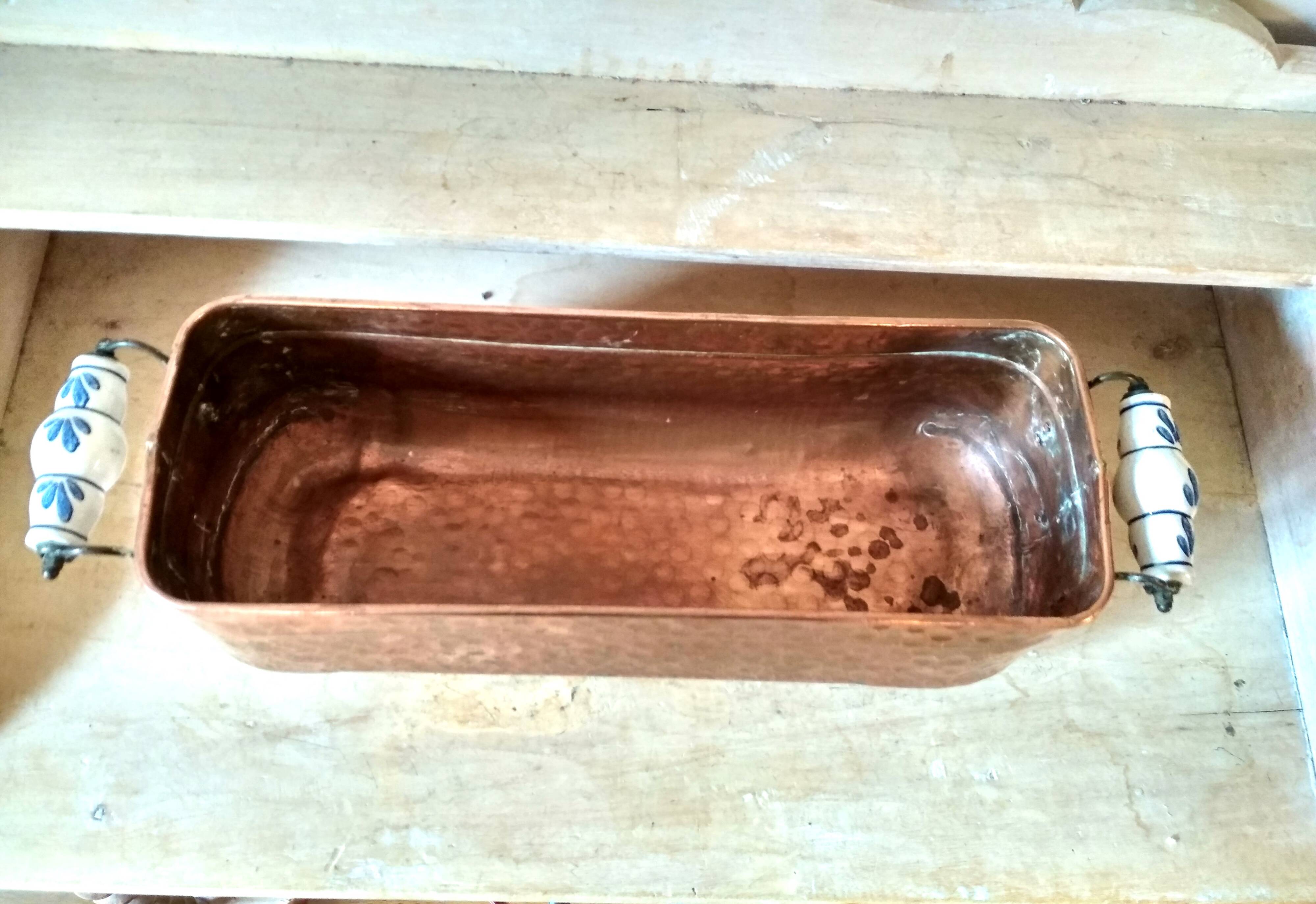 Large brass and copper planter, tray on 4 lion paw feet