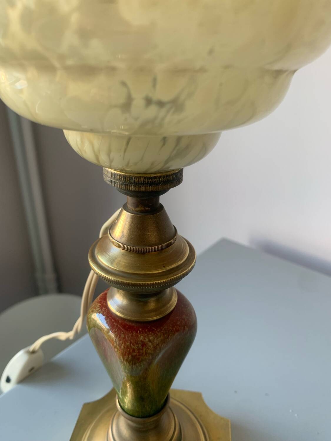 Old ceramic and brass lamp, Clichy glass globe
